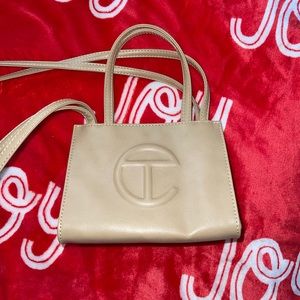 Telfar global small cream handbag